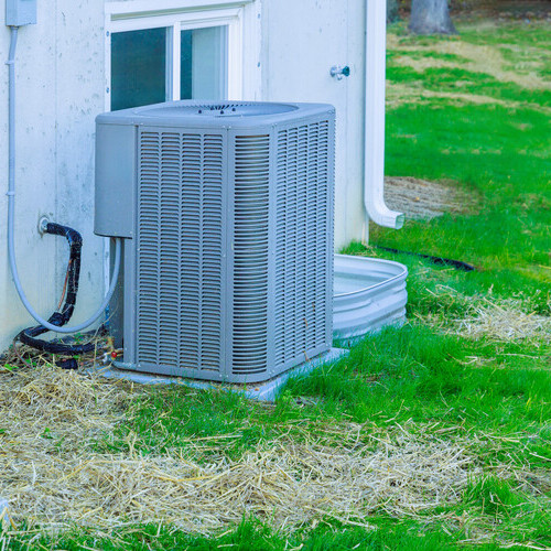 air conditioning unit sitting outside a house
